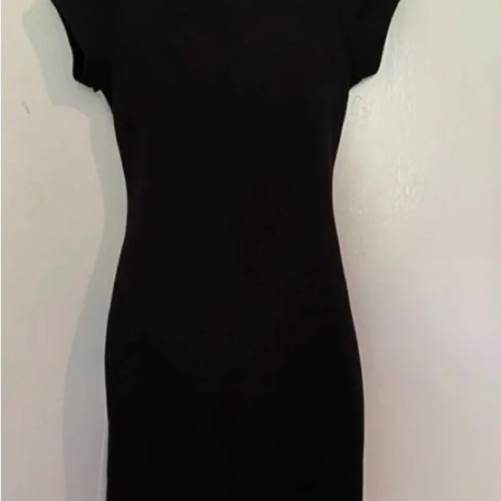 Almost Famous Black and White Asymmetrical Bodycon Dress - Picture 3 of 5